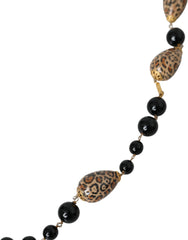 Collier long à perles imprimées noires en laiton doré Dolce & Gabbana