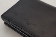 Portefeuille bandoulière Dolce & Gabbana en cuir noir pour femme