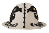 Chapeau Dolce & Gabbana en laine blanche et noire avec broche camée brodée et camée