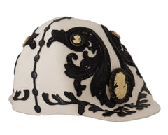 Chapeau Dolce & Gabbana en laine blanche et noire avec broche camée brodée et camée