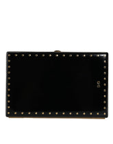 Pochette de soirée Dolce & Gabbana en cuir noir clouté avec cadre doré