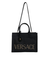 Sac cabas bandoulière Versace en toile et cuir noir avec poignée supérieure et logo