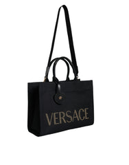 Sac cabas bandoulière Versace en toile et cuir noir avec poignée supérieure et logo