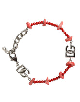 Bracelet Dolce & Gabbana en laiton argenté, perles de résine et logo DG.