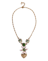 Collier pendentif Dolce & Gabbana en laiton doré et cristal, orné d'un lys et d'un cœur sacré