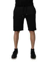 Short de survêtement Dolce & Gabbana en coton noir, style bermuda, pour homme.