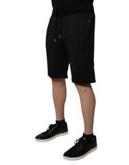 Short de survêtement Dolce & Gabbana en coton noir, style bermuda, pour homme.