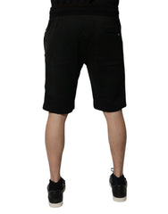 Short de survêtement Dolce & Gabbana en coton noir, style bermuda, pour homme.