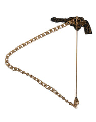 Dolce & Gabbana Brosche/Anstecknadel mit Revolvermotiv aus Schwarz, Gold, Messing und Kupfer