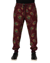 Pantalon de jogging Dolce & Gabbana bordeaux à imprimé plumes de paon