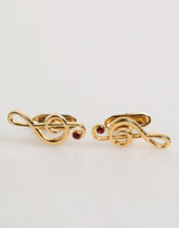 Boutons de manchette Dolce & Gabbana en laiton doré avec motif de note de musique