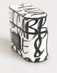 Dolce & Gabbana AirPods-Hülle aus schwarzem und weißem Leder mit Monogramm-Print und Logo