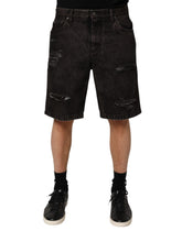 Dolce & Gabbana Schwarze Bermuda-Shorts aus zerrissenem Baumwoll-Denim für Herren