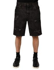 Dolce & Gabbana Schwarze Bermuda-Shorts aus zerrissenem Baumwoll-Denim für Herren