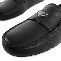 Prada Slipper aus schwarzem Kalbsleder
