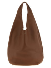 A.P.C. brown cowhide leather shoulder bag in a structured minimalist silhouette with gold-tone hardware.