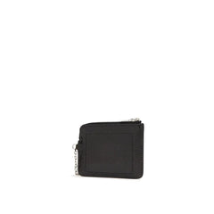 Side profile of the Alexander McQueen leather clutch showing the slim construction and refined edge finishing.