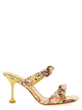 Alexandre Birman bicolor cowhide stiletto sandals featuring a minimalist black and white leather design.