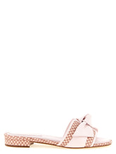 Alexandre Birman multicolor cowhide slides featuring a vibrant patchwork design and signature knotted strap detail.