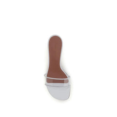Close-up detail of the Amina Muaddi white calf leather sandal insole and fine stitching on the square-toe silhouette.