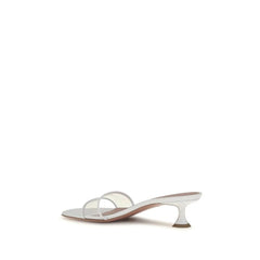 Rear view of the Bos Taurus sandal by Amina Muaddi in white leather, highlighting the geometric heel base and craftsmanship.