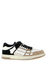Amiri låga sneakers i flerfärgad nötläder med en förfinad paneldesign och signaturlyxsilhuett.