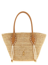 Christian Louboutin beige raffia tote bag with signature red leather handles and embroidered logo front view.