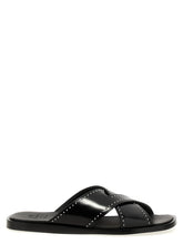 Church's Bos Taurus slides in black calf leather featuring a minimalist wide-strap design and refined flat profile.