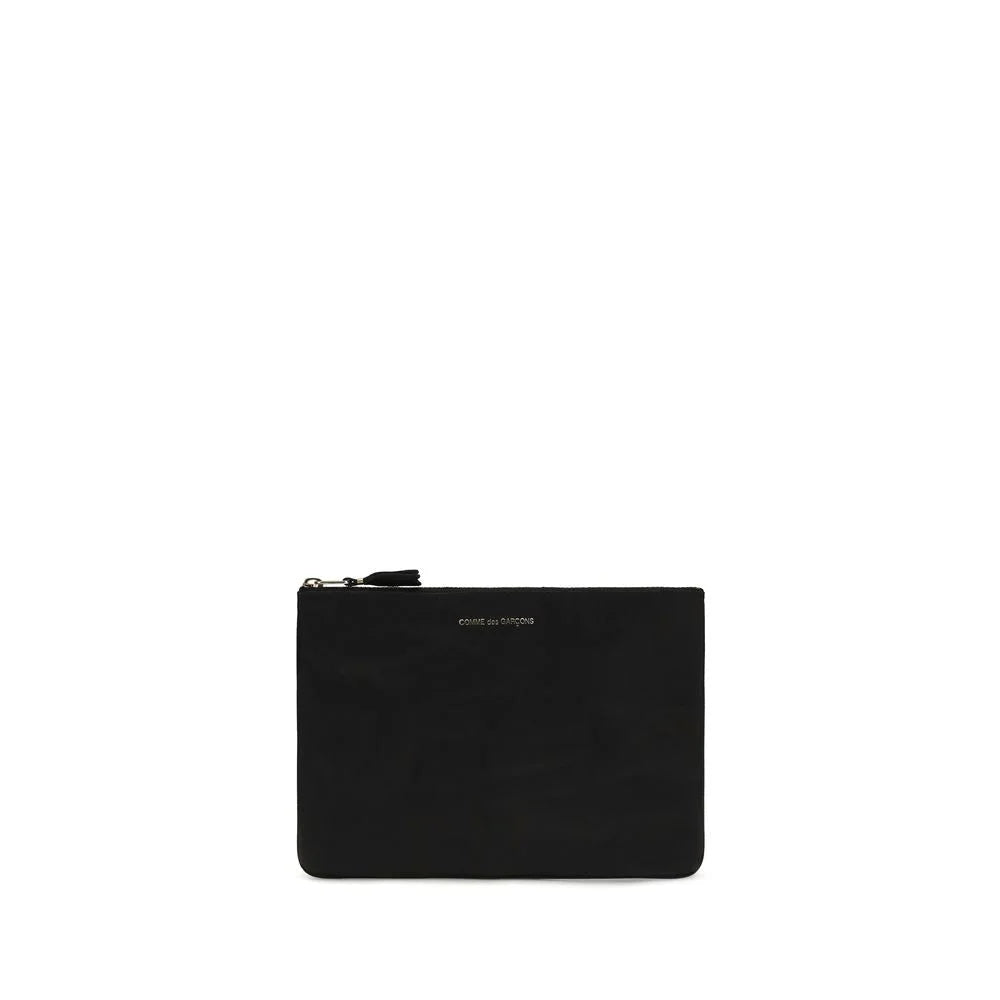 Billetera Comme Des Garçons en cuero negro Bos Taurus