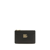 Dolce & Gabbana black calf leather Bos Taurus wallet featuring a sleek front profile and silver-tone logo hardware.