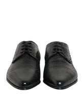 Dolce & Gabbana black exotic leather lace-up Derby shoes featuring a textured finish and classic formal silhouette.