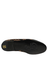 Dolce & Gabbana black floral jacquard dress loafers featuring a refined almond toe and subtle textured pattern.