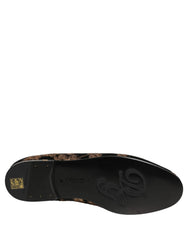 Dolce & Gabbana black floral jacquard dress loafers featuring a refined almond toe and subtle textured pattern.