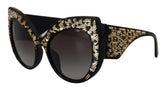 Dolce & Gabbana DG4326 sorte acetat solbriller med gyldne paljetdetaljer og polariserede glas.