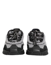 Dolce & Gabbana NS1 low top sneakers in black and gray mixed-media calf leather and virgin wool, front view.