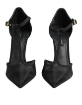 Dolce & Gabbana black mesh T-strap stiletto heels featuring a pointed toe and elegant evening silhouette.