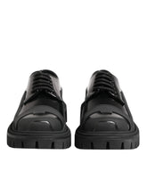 Dolce & Gabbana schwarze Lackleder-Trekking-Derby-Schuhe aus patentiertem Kalbshirn mit hochglänzendem Finish und klobigem Profilsohle.