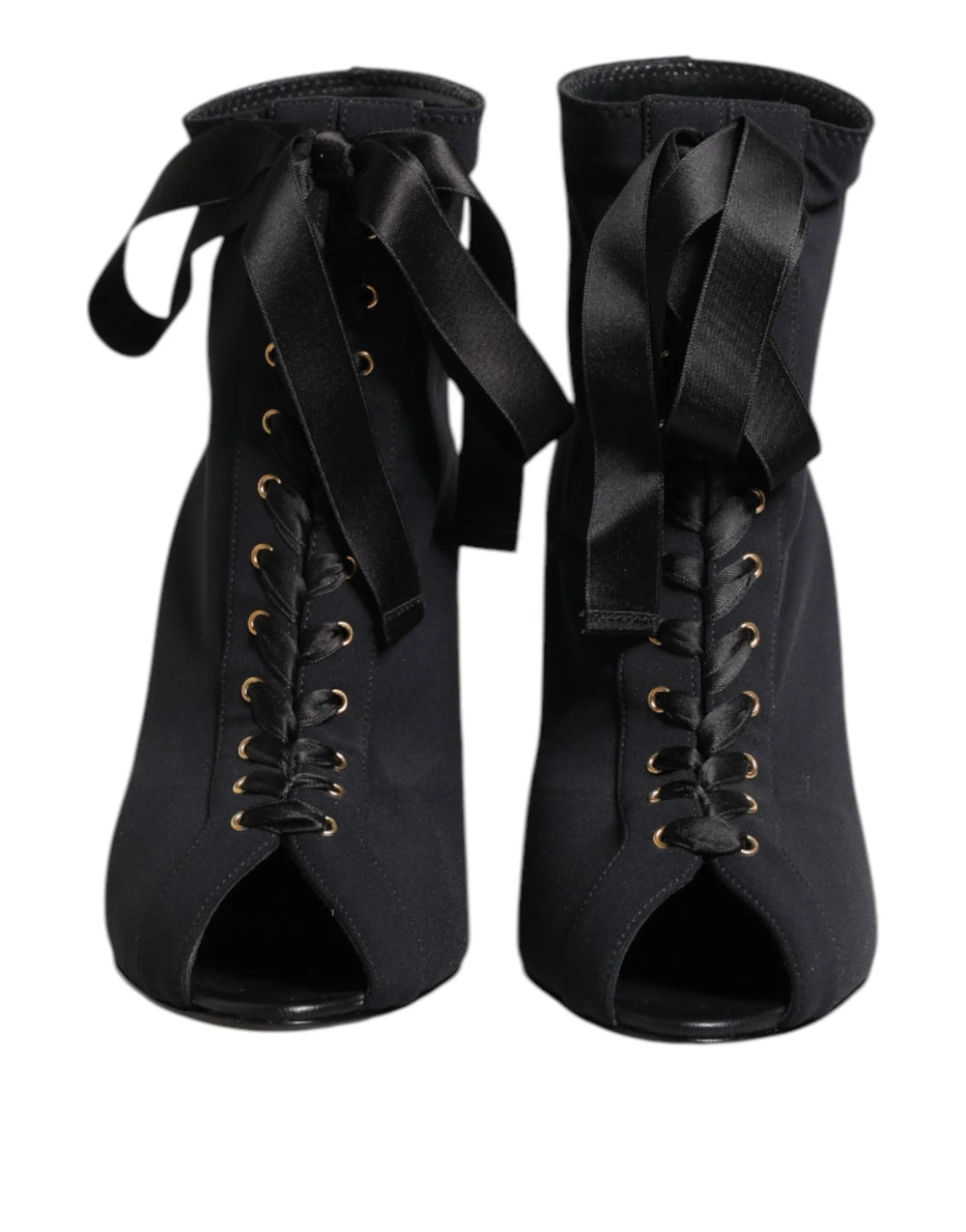Dolce & Gabbana black leather ankle boots featuring a pointed toe, lace-up front, and elegant stiletto heel.