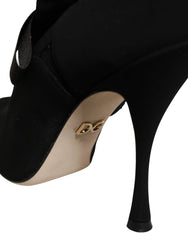 Dolce & Gabbana schwarze Stilettetten-Mid-Calf-Stiefel aus Stretch-Material mit einer schlanken spitz zulaufenden Zehenpartie und einer eleganten High-Heel-Silhouette.