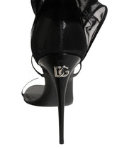 Dolce & Gabbana black stiletto sock boots featuring a sleek pointed toe and high heel silhouette in nylon and calf leather.