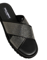 Dolce & Gabbana men's black leather slide sandals with criss-cross straps and tonal strass crystal embellishments.