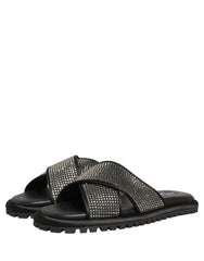 Top-down view of the criss-cross strap design featuring shimmering black crystals on high-quality Italian leather.