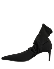 Priveliște din spate a botinelor Dolce & Gabbana din material elastic, evidențiind construcția fără cusături și alinierea verticală a călcâiului.