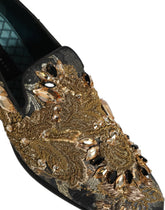 Dolce & Gabbana men's black velvet loafers featuring intricate crystal embellishments and a refined evening silhouette.