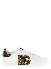 Sneakers basse in pelle di vitello marrone Dolce & Gabbana con una silhouette raffinata e lacci tono su tono per un'estetica classica.