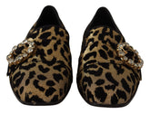 Dolce & Gabbana Damen-Loafer mit Leopardenmuster, goldfarbenem Baumwollstoff und mit Kristallen besetzten Vamps.