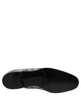 Dolce & Gabbana men's multicolor velvet loafers featuring a vibrant baroque pattern and leather trim.