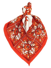Dolce & Gabbana vibrant orange silk umbrella featuring a classic canopy shape and elegant long handle for women.