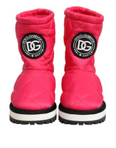 Dolce & Gabbana fuchsia pink and white padded mid-calf boots in a quilted viscose blend with flat soles.