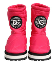Dolce & Gabbana fuchsia pink and white padded mid-calf boots in a quilted viscose blend with flat soles.